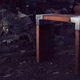 Image for article titled Casting Molten Metal On Wood With a Hungarian Design Master
